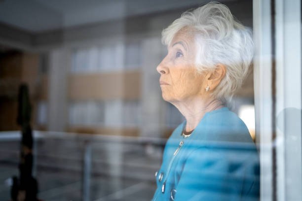 istock Senior woman contemplating at home 1314772113