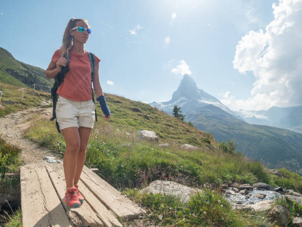 istock Woman hikes in the Swiss Alps 1314772471