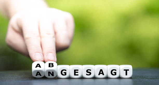 istock Hand turns dice and changes the German word 