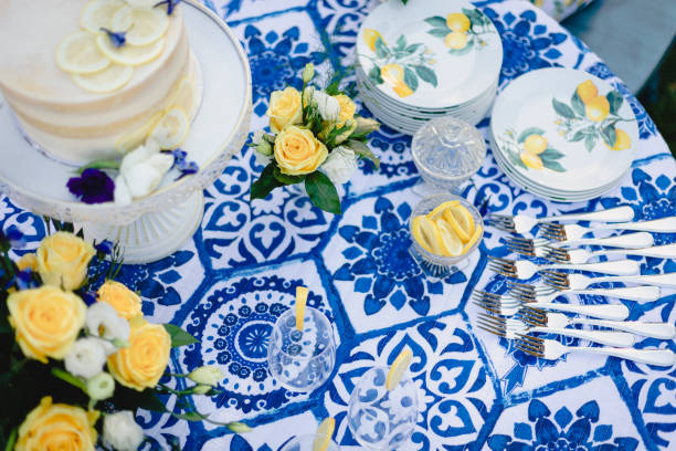istock Navy blue and yellow table setting for outdoor wedding reception 1314776455