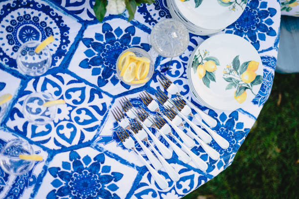 istock Navy blue and yellow table setting for outdoor wedding reception 1314776505