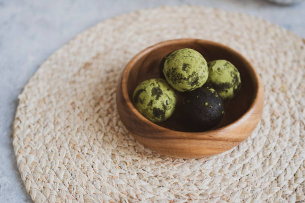 istock energy balls on a light table, bowl. Homemade healthy sweets 1314777327
