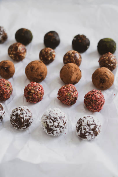 istock energy balls on a light table, bowl. Homemade healthy sweets 1314777865