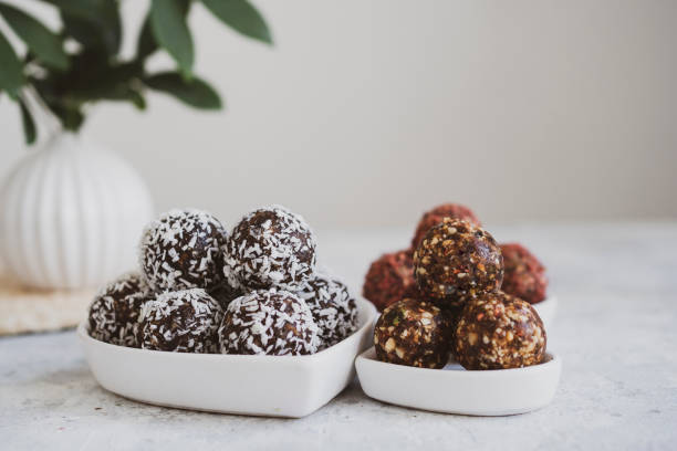 istock energy balls on a light table, bowl. Homemade healthy sweets 1314777866