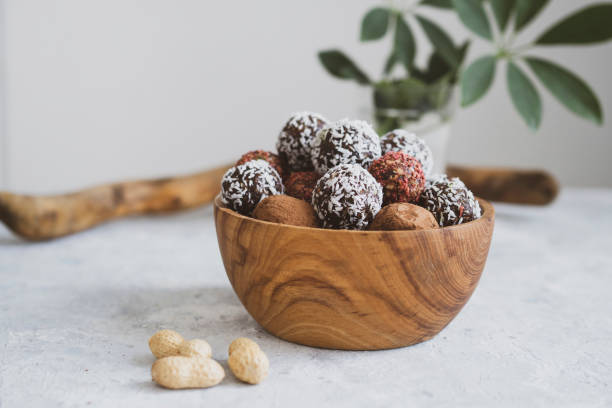 istock energy balls on a light table, bowl. Homemade healthy sweets 1314777867