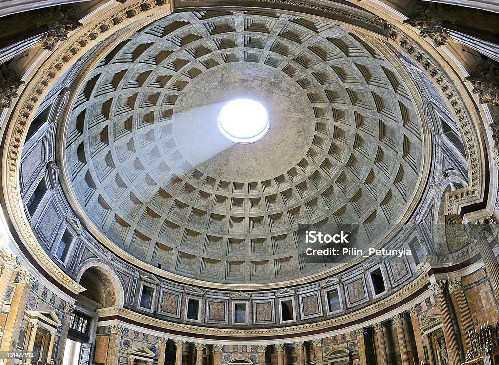 Ancient architectural masterpiece of Pantheon in Roma, Italy Ancient architectural masterpiece of Pantheon in Roma, Italy. Panorama of inside interior Pantheon - Rome Stock Photo
