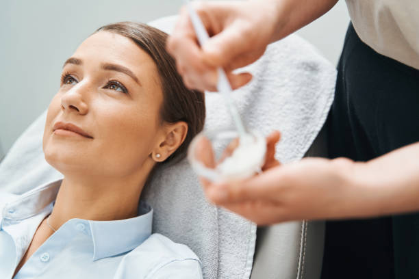 istock Qualified cosmetologist preparing her patient for a cosmetic procedure 1314779158