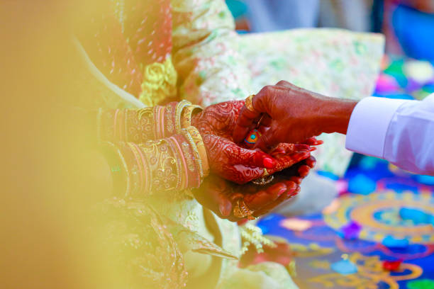istock Indian couple hand in wedding Satphera ceremony in hinduism 1314779965