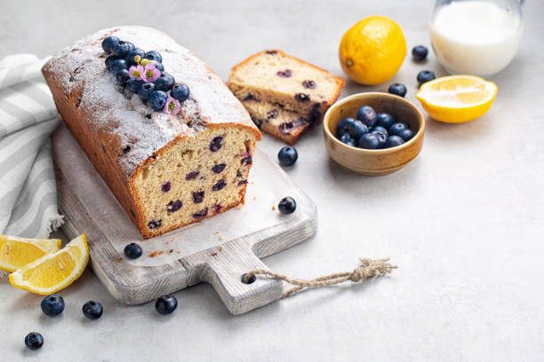 istock Breakfast with homemade fruit cake with blueberry and lemon. Diagonal composition. Copy space. 1314780761
