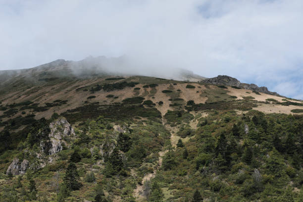 istock mountains and clouds along the Yunnan-Tibet route 1314780816