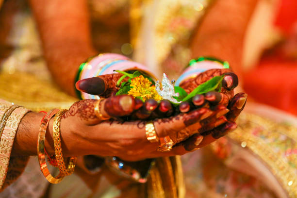 istock Traditional indian wedding ceremony, groom and bride hand 1314781236