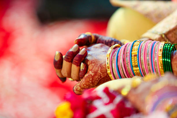 istock Indian couple hand in wedding Satphera ceremony in hinduism 1314781271