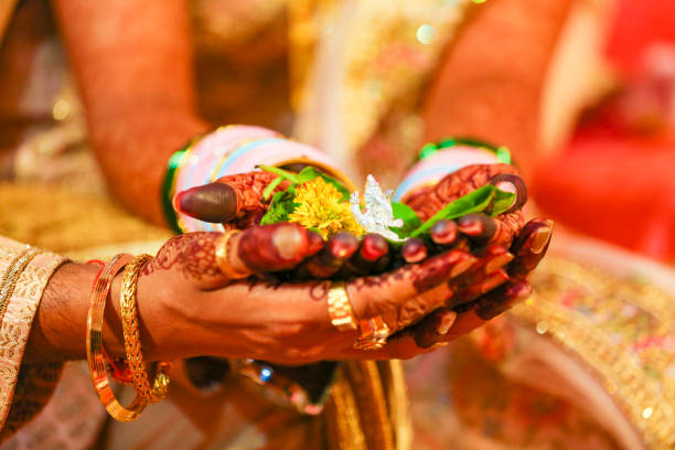 istock Traditional indian wedding ceremony, groom and bride hand 1314781401