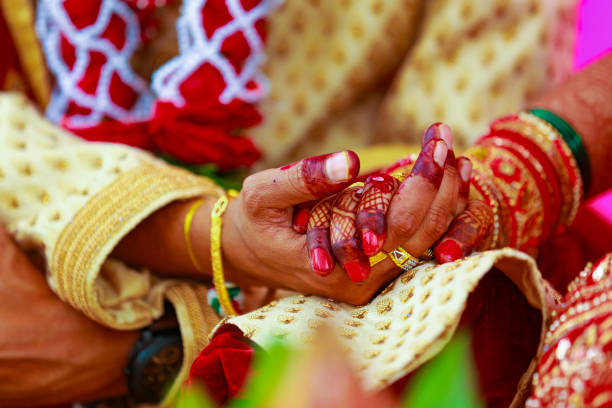 istock Indian couple hand in wedding Satphera ceremony in hinduism 1314781484