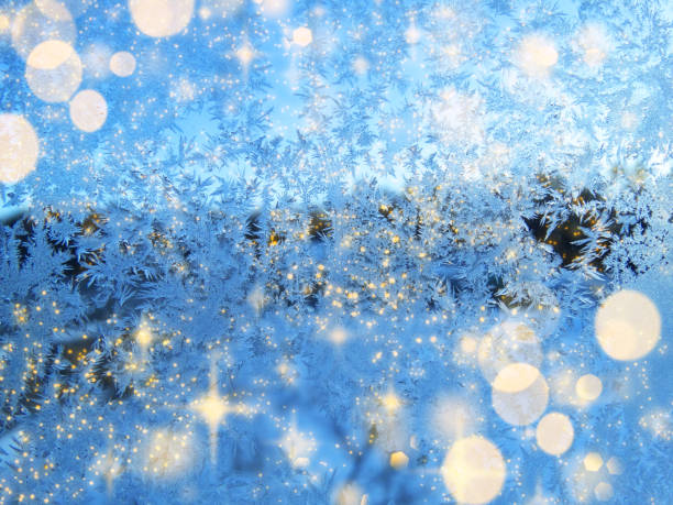 istock new year lights winter background with snow and snowflakes 1314782368