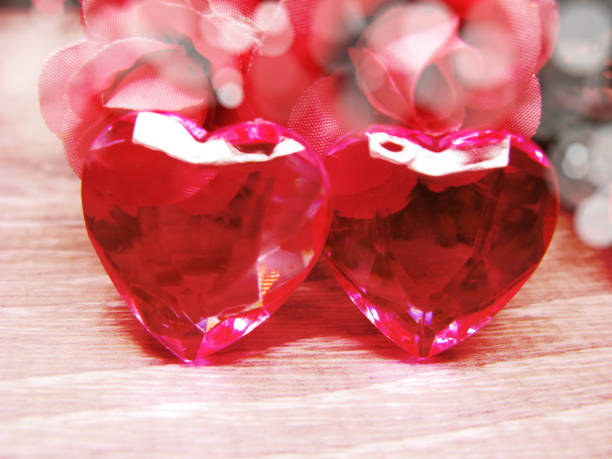 istock crystal gem two ruby hearts and roses flowers love valentine's day background 1314782936