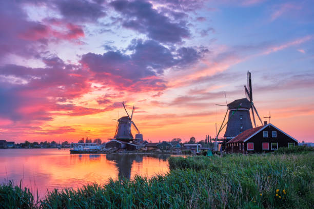 istock Windmills at Zaanse Schans in Holland on sunset. Zaandam, Nether 1314783784