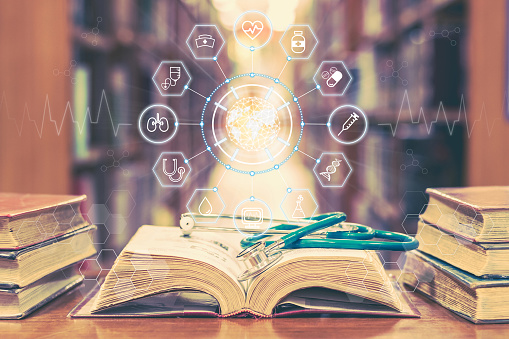 Medical school education with telemedicine and telehealth science study, AI lab research concept with global healthcare educational icons on old book and stethoscope in learning class room or library