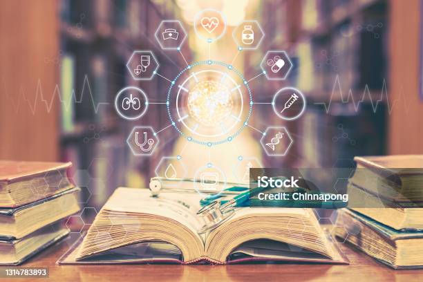 Medical School Education With Telemedicine And Telehealth Science Study Ai Lab Research Concept With Global Healthcare Educational Icons On Old Book And Stethoscope In Learning Class Room Or Library Stock Photo - Download Image Now