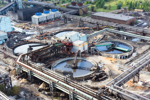 Industrial pipelines on metal in a metallurgical plant. Sewage treatment station. Aerial view. Constraction site