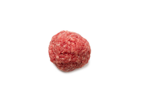 istock Raw meat balls isolated on white background. 1314785226