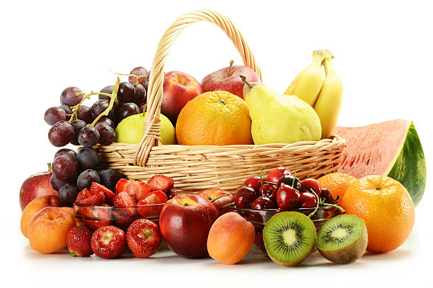 istock Fruits and wicker basket isolated on white 131478546