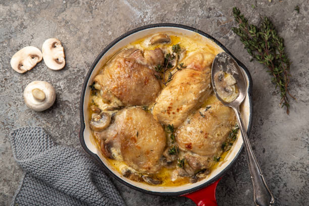 istock chicken with mushroom in cream garlic sause  on pan 1314786528