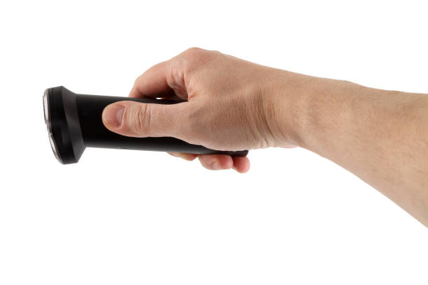 istock bare caucasican hand holding three razor black electric shaver - isolated 1314786813