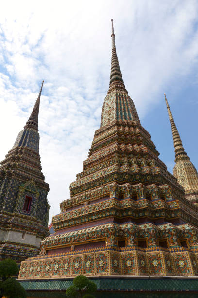 istock Religious structures from garden of Wat Pho Buddhist Temple in Bangkok 1314788085