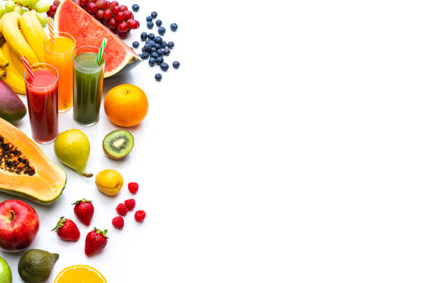 istock Juices and fruits border on white background 1314791589