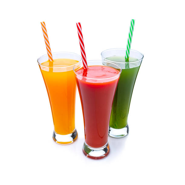 istock Fruit juice glasses isolated on white. High angle view 1314791602