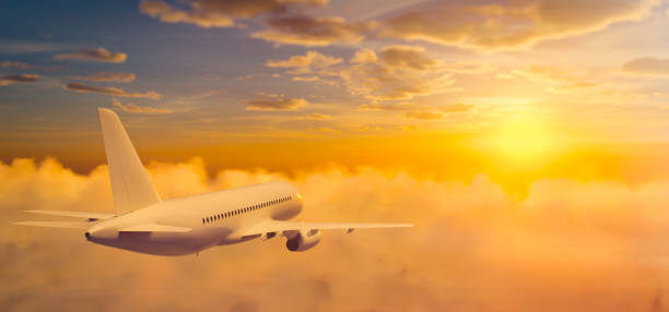 istock Passenger airplane flying above clouds during sunset. 3D rendering illustration. 1314791707