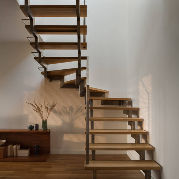 istock Modern stairs in sunny interior, close-up 1314793423