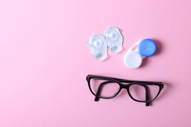 istock Glasses and lenses for correcting vision on a colored background. 1314798812