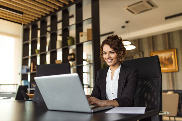 istock Beautiful positive executive at work, portrait. 1314800183