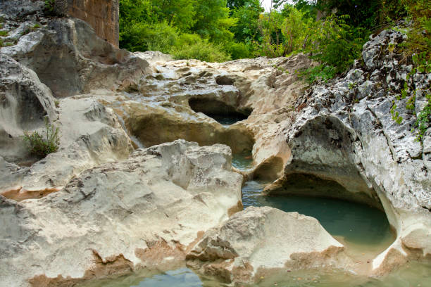 istock Mirna river flows, forming waterfalls and hollowing cauldron-like forms in stone 1314803068