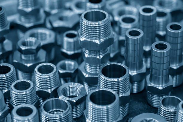 The pile of special industrial pipeline connector parts. The pile of special industrial pipeline connector parts. The plumping parts  manufacturing concepts. coupling stock pictures, royalty-free photos & images