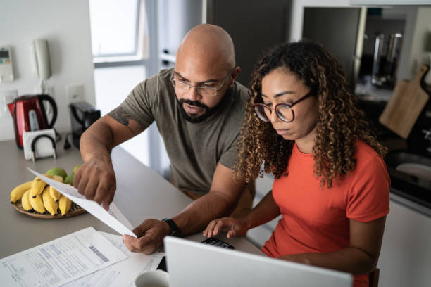 istock Couple doing home finances together at home 1314803341