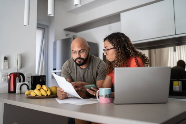 istock Couple doing home finances together at home 1314803885