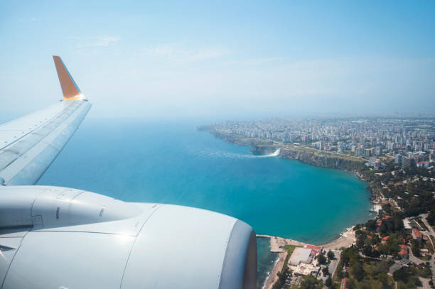 istock Clouds and sky as seen through window of an aircraft 1314807281