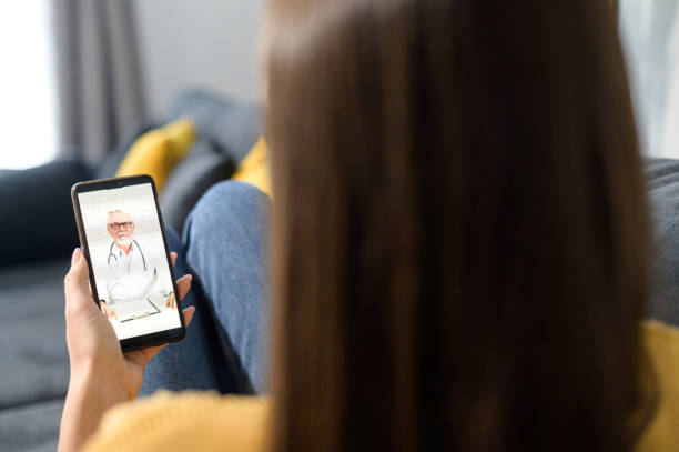 istock A young woman with a smartphone at home 1314808269