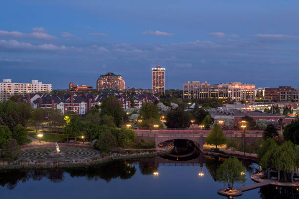 Blue Hour over Bloomington, Minnesota A Twilight Long Exposure Shot over the Beautiful Suburban Bloomington Skyline and Centennial Lakes Reflections minnesota stock pictures, royalty-free photos & images
