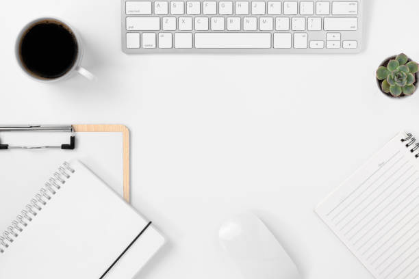 istock Minimal Office desk table top view with office supply and coffee 1314810147