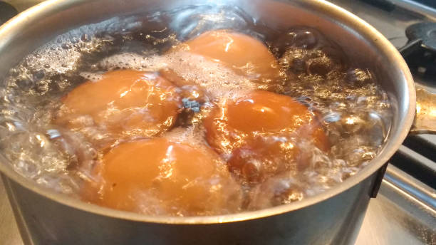 istock Saucepan with eggs in boiling water 1314811914