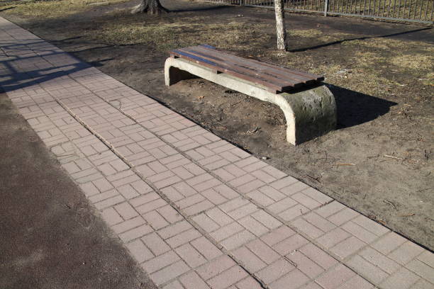 istock park benches on a sunny morning 1314812231