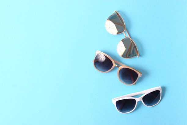 istock set of sunglasses on a colored background top view. 1314812995