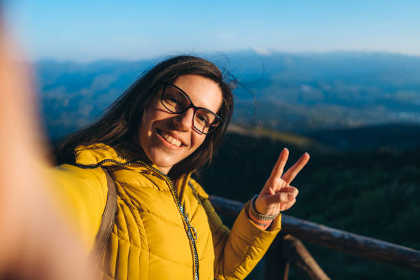 istock Woman making selfie with beautiful landscape 1314813883