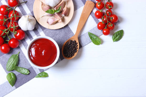 istock Ketchup on the table. Tomato sauce, fresh tomatoes. 1314819864