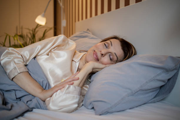 istock Mature woman in bed, sleeping 1314820016