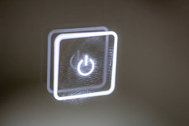 istock a glowing touch button stained with finger marks. turn on off. 1314823795